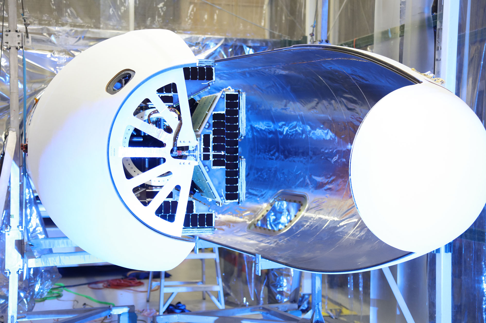 Pegasus Fairing Resize A view of rocket fairing in assembly plant