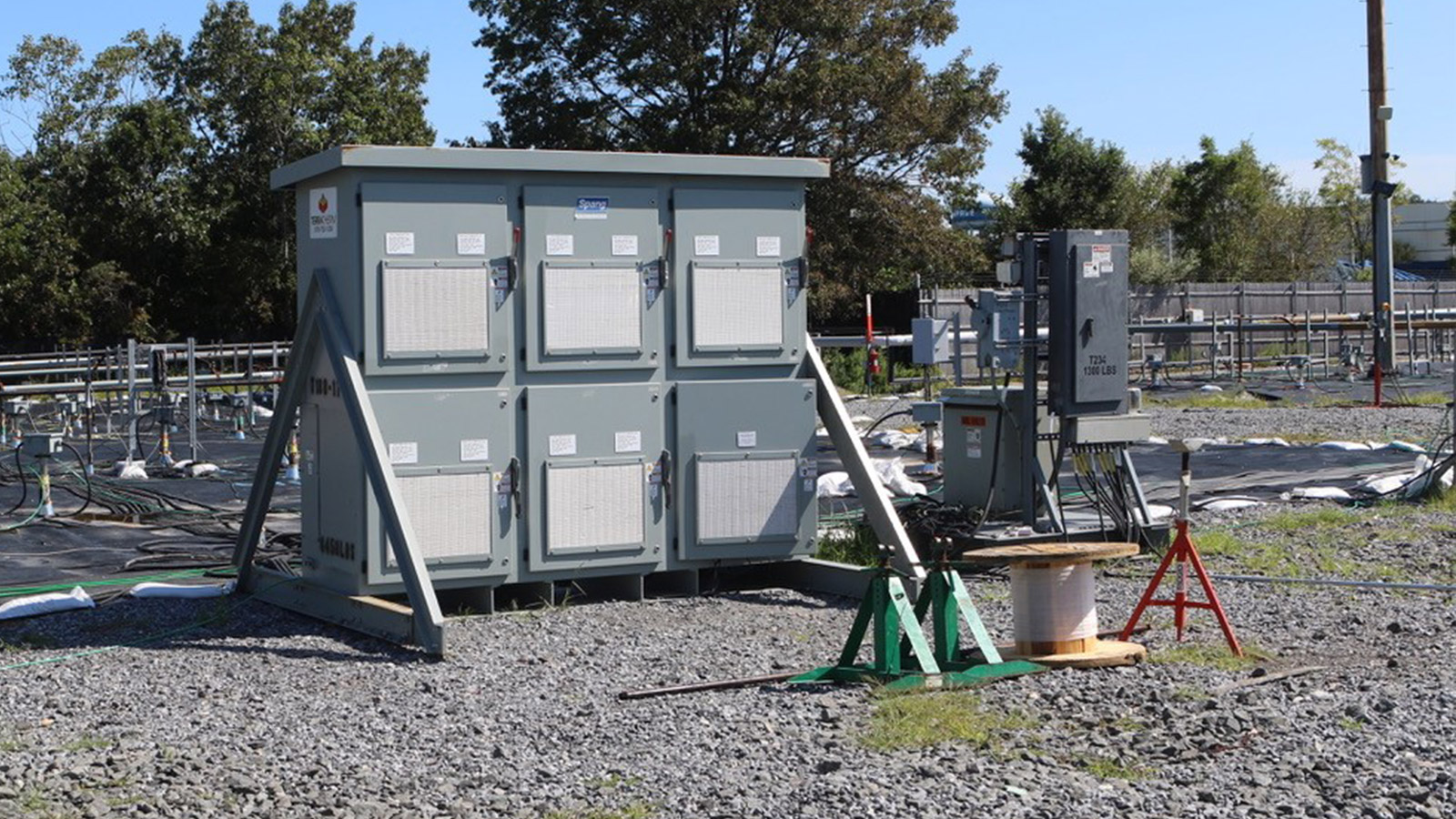 Bethpage Soil Cleanup Work Zone six grey storage boxes