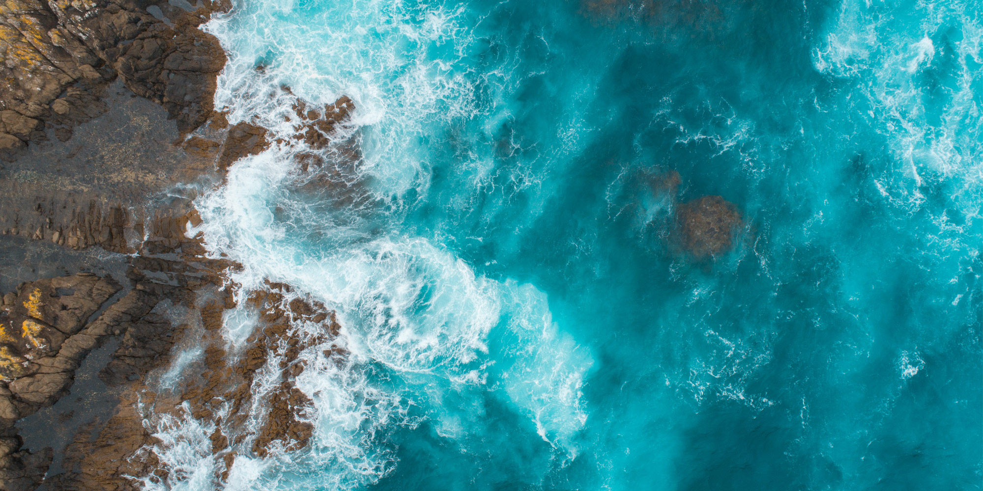 blue ocean rocky shore